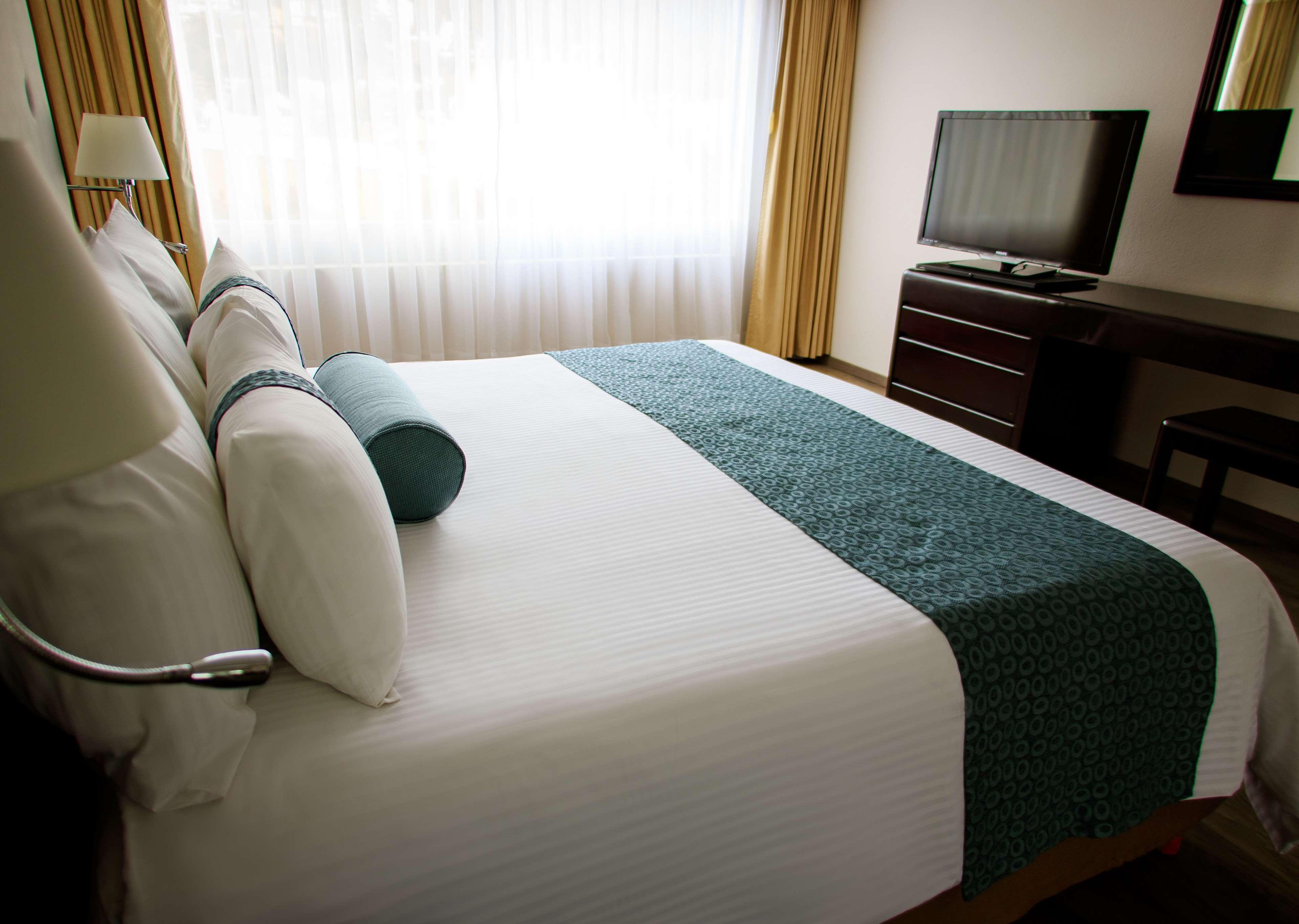 莫雷利亚格兰贝斯特韦斯特plus酒店 外观 照片 A bed runner
