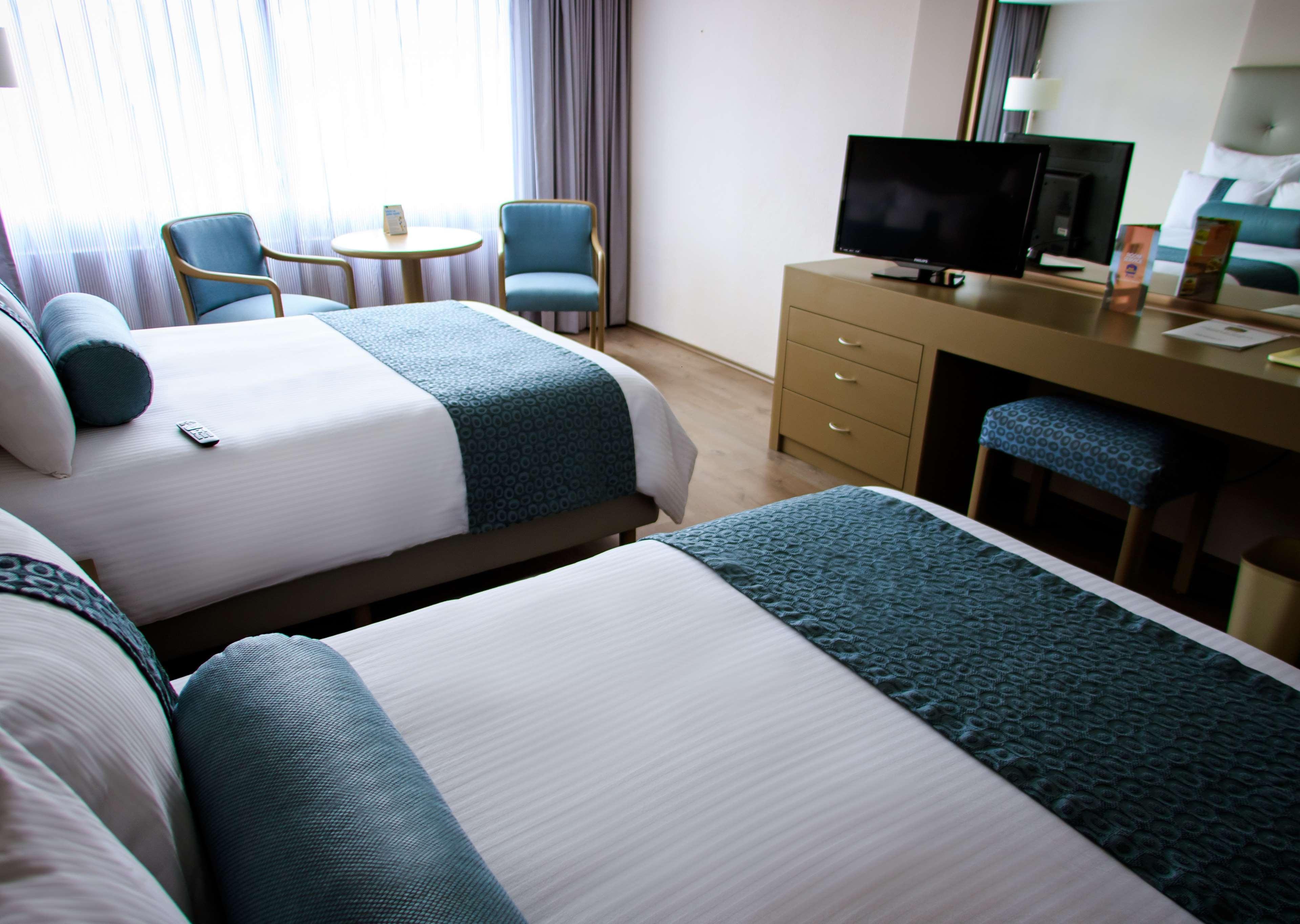 莫雷利亚格兰贝斯特韦斯特plus酒店 外观 照片 A room at the hotel