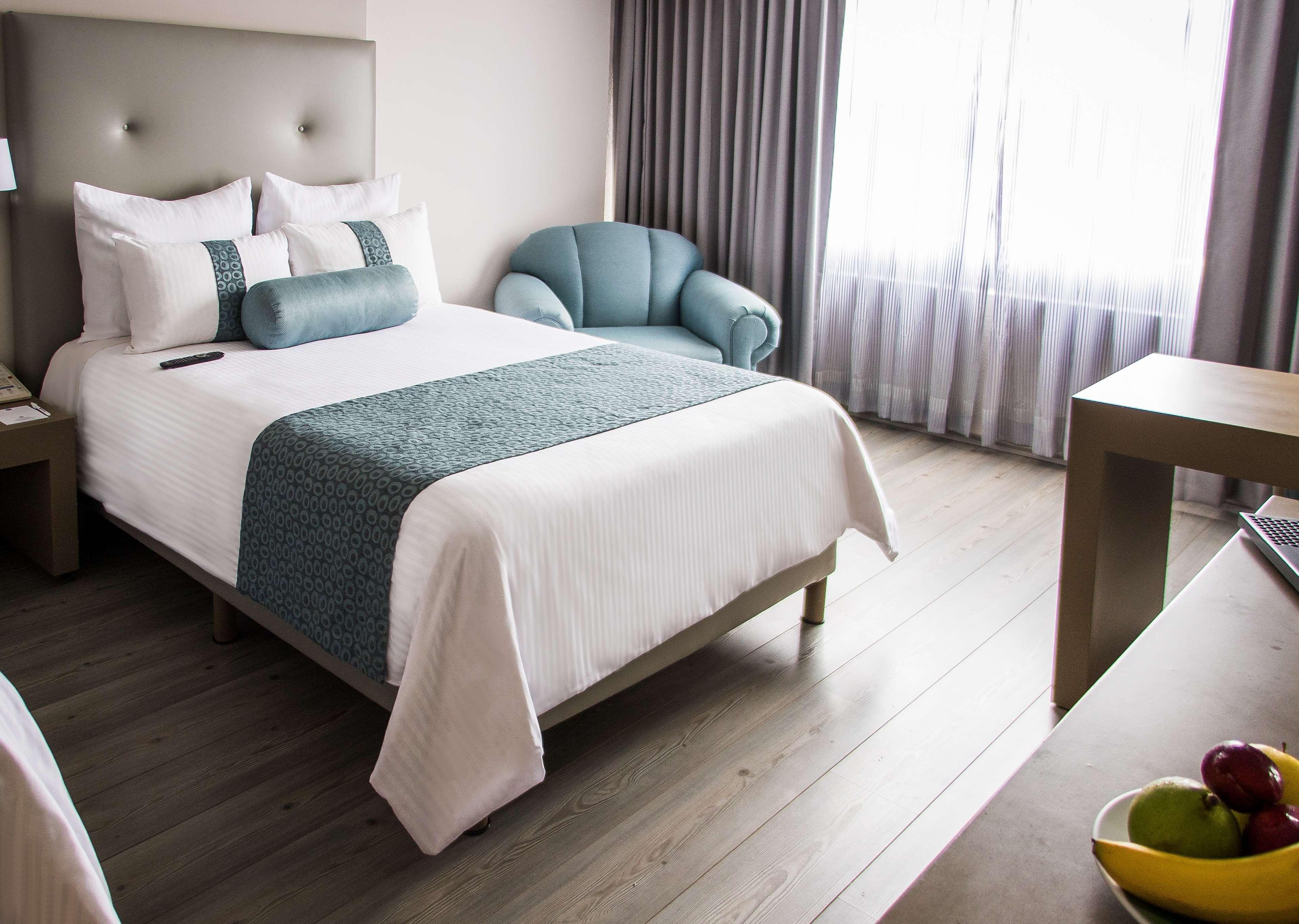 莫雷利亚格兰贝斯特韦斯特plus酒店 外观 照片 A room at the hotel