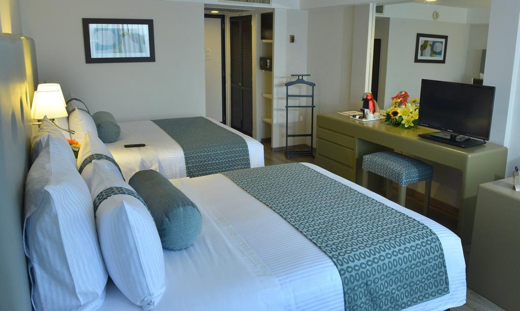 莫雷利亚格兰贝斯特韦斯特plus酒店 外观 照片 A room at the hotel