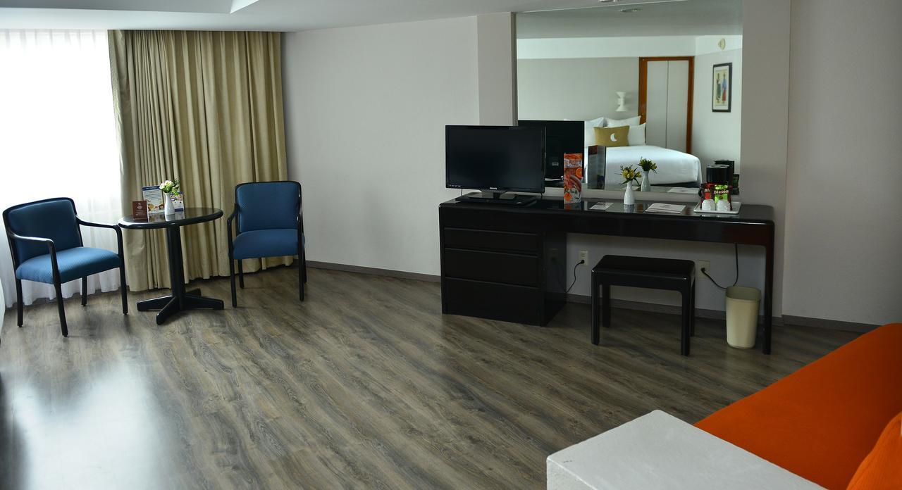 莫雷利亚格兰贝斯特韦斯特plus酒店 外观 照片 A room at the hotel